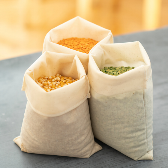 Three Food Huggers Fabric Bulk Bag reusable alternative to plastic bags filled with grains