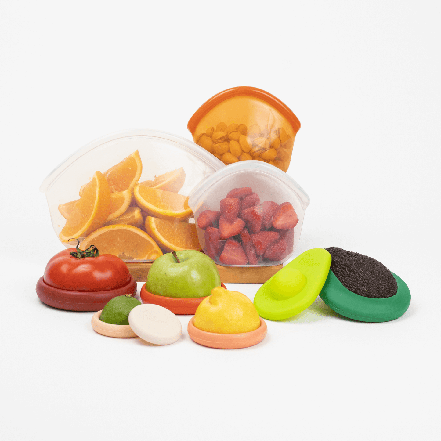 Set of ten silicone orange Food Huggers, a sustainable alternative to plastic wrap, to protect fruits and vegetables