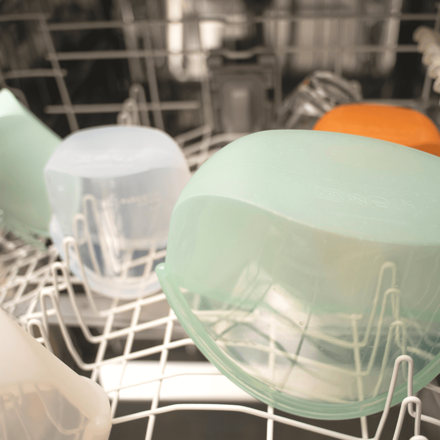 "Hugger Bags placed in a dishwasher alternative to plastic wrap eco friendly solution"