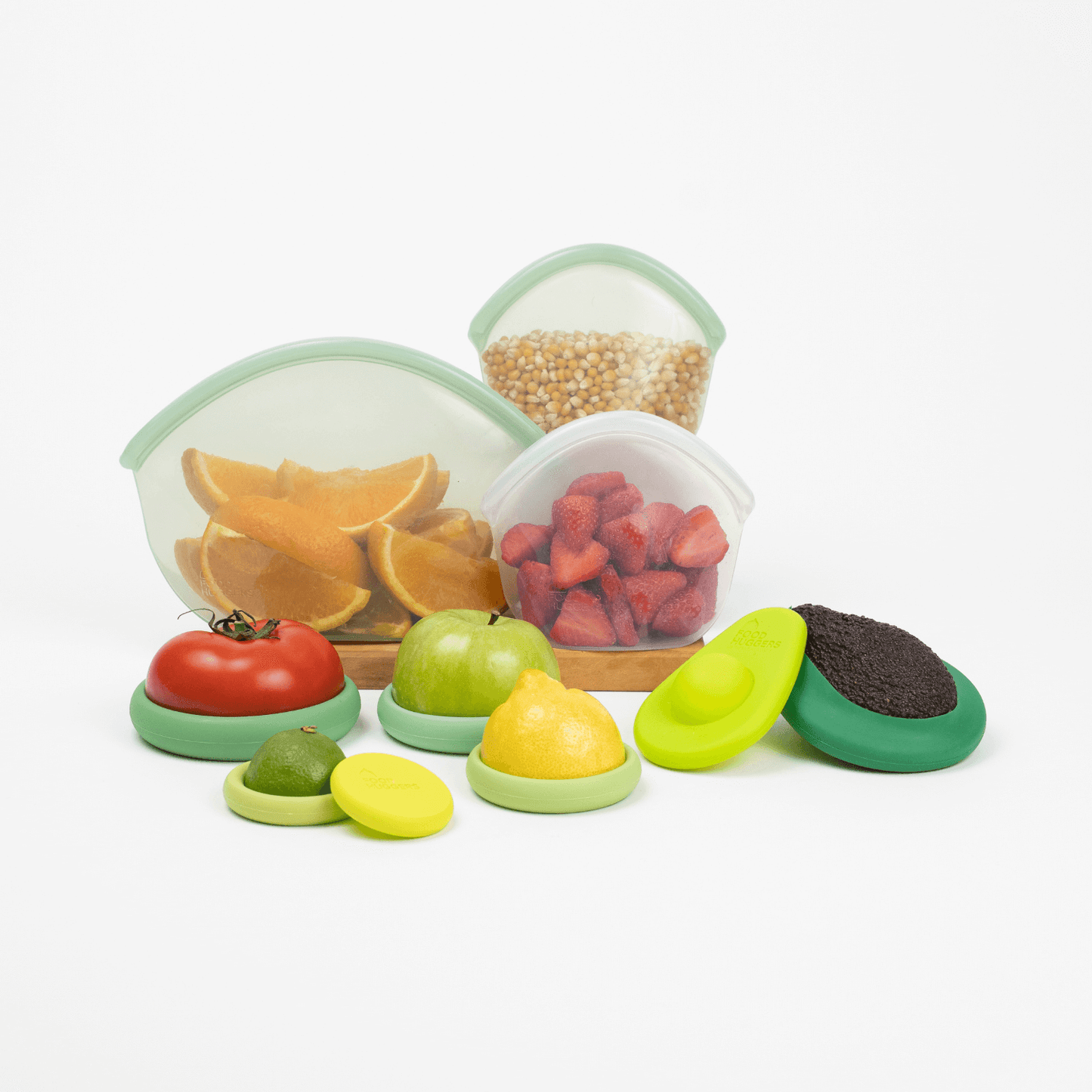 Set of ten silicone green Food Huggers, a sustainable alternative to plastic wrap, to protect fruits and vegetables