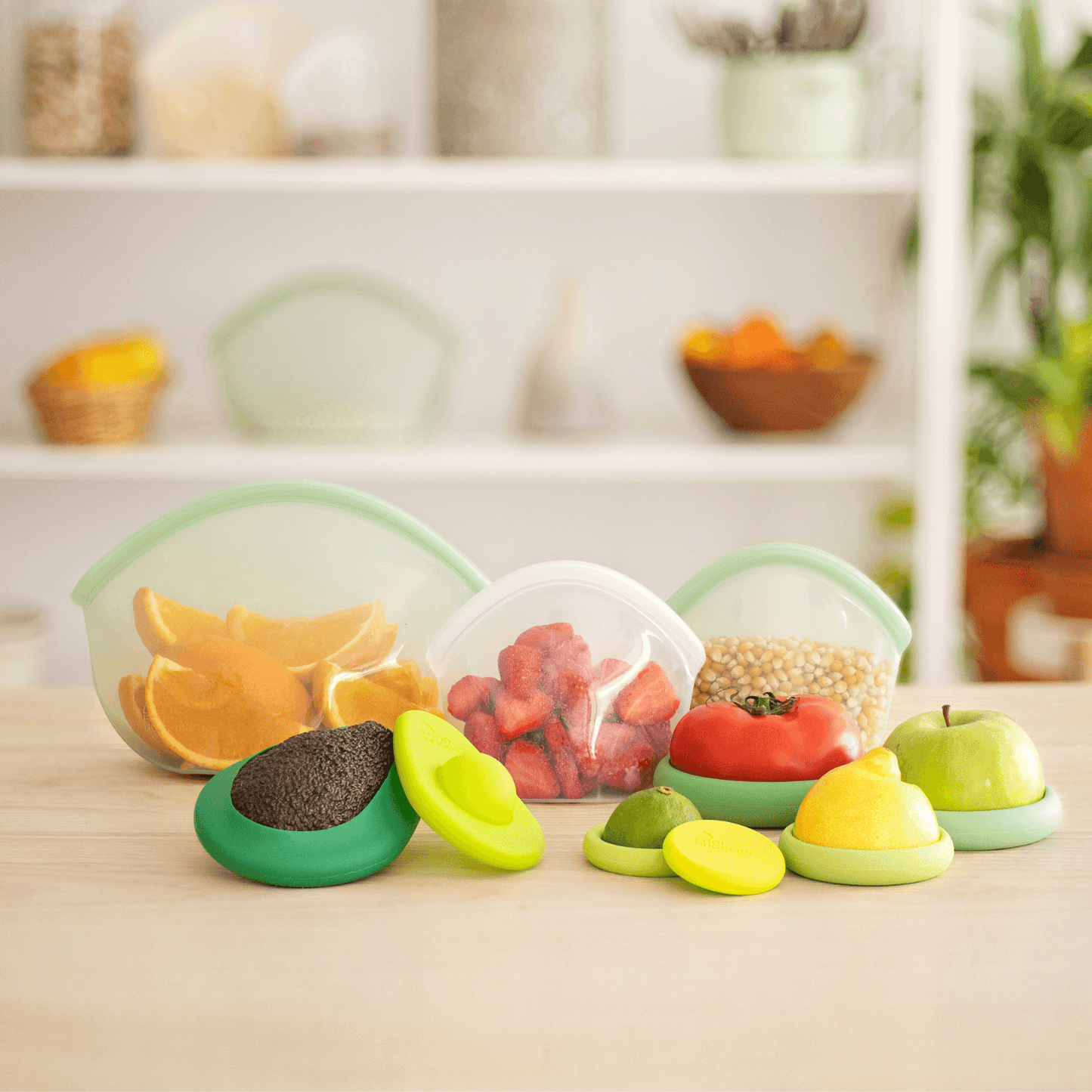 Set of ten silicone Food Huggers protecting fruits and vegetables on a wooden table, sustainable alternative to plastic wrap