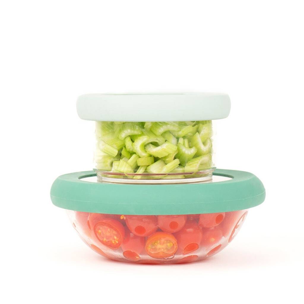 Two glass bowls one on top of the other with a hugger lid preserving food for a sustainable kitchen