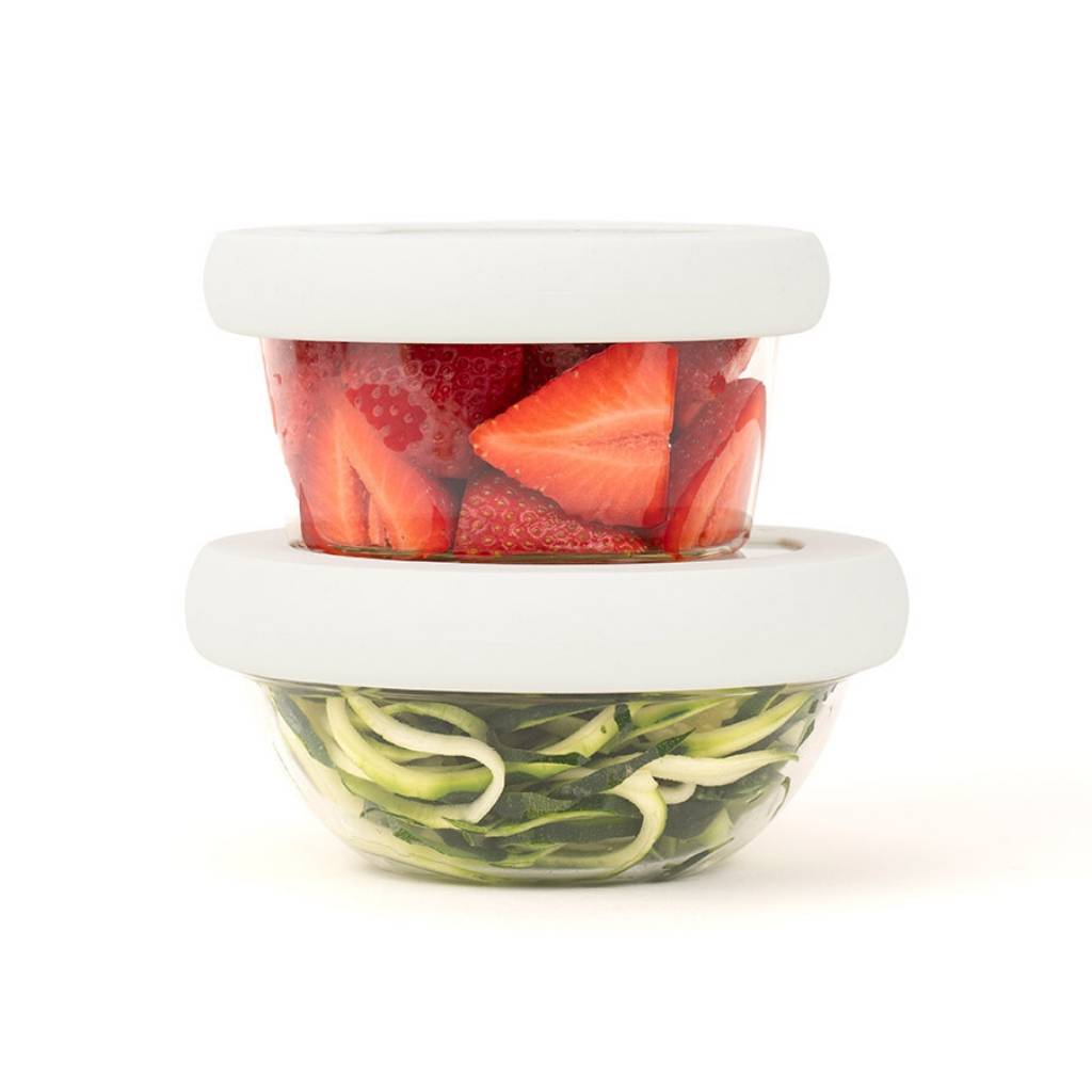 Two glass bowls one on top of the other with a white hugger lid preserving food for a sustainable kitchen