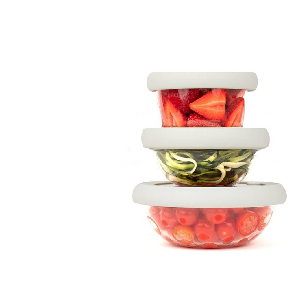 Three glass bowls one on top of the other, with BPA-free silicone white lids that preserve fruits and vegetables
