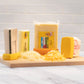 Four Cheese Hugger preserving cheese on a wooden board with grated cheese the perfect alternative to plastic wrap
