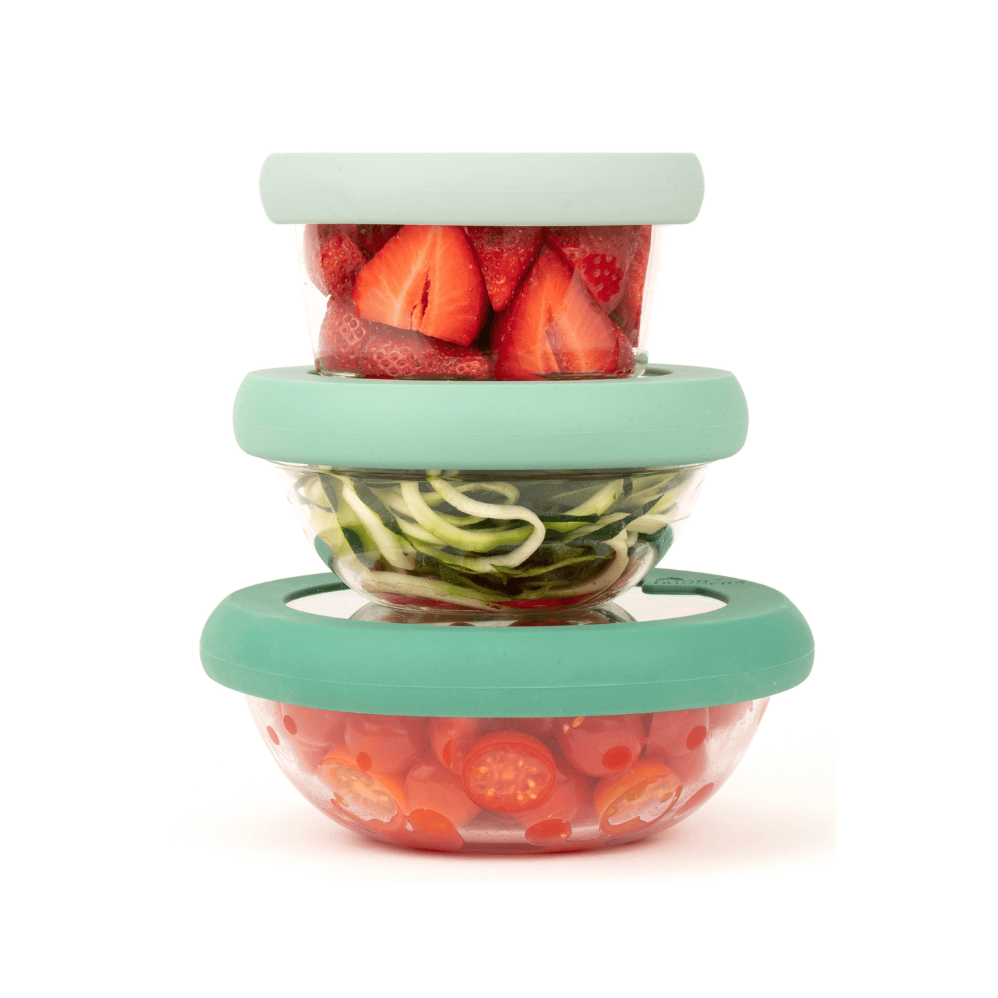 Three glass bowls one on top of the other, with BPA-free silicone green lids that preserve fruits and vegetables